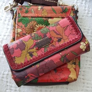 Sakroots wallet with floral laminate boho pattern